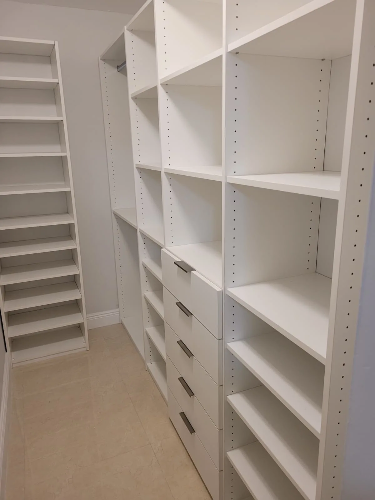 Full room of custom white closet shelving