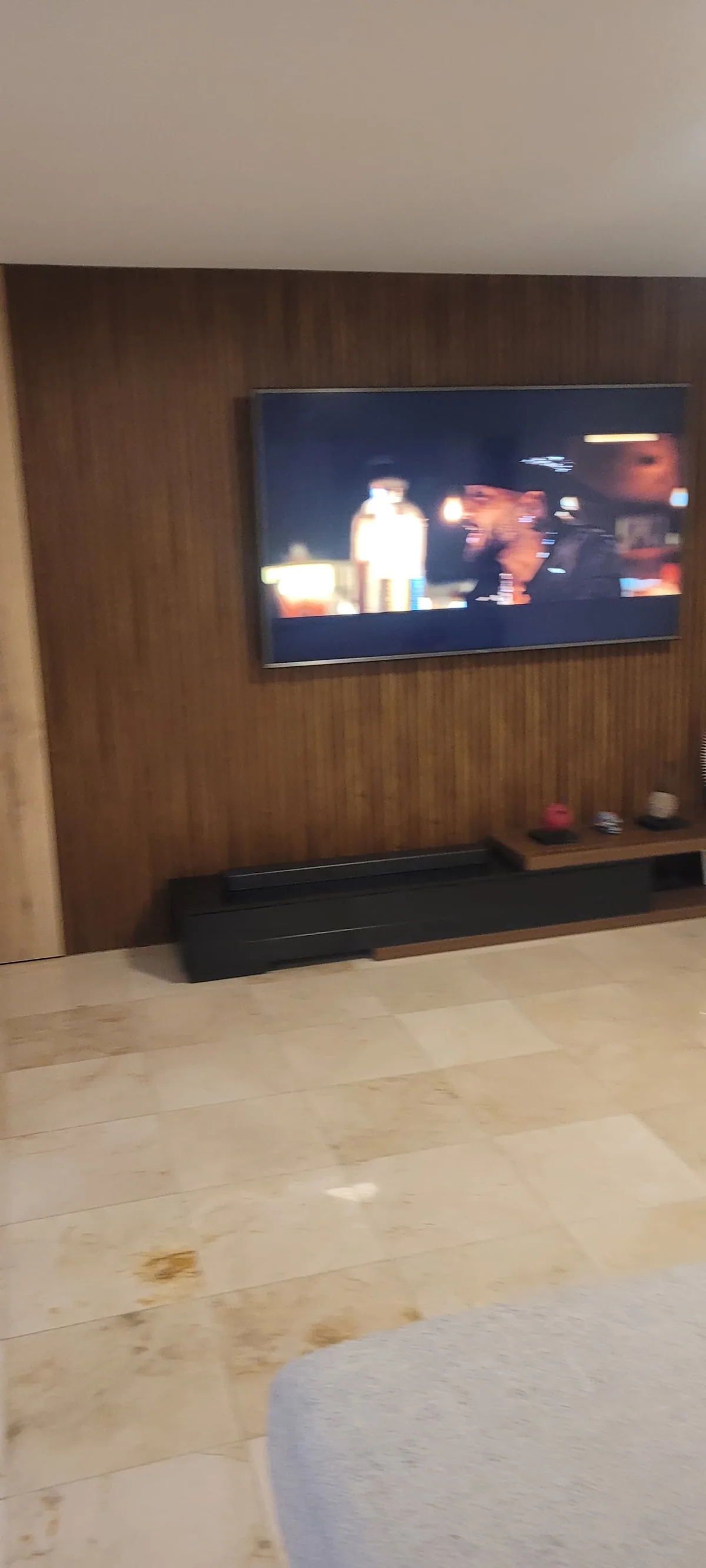 Wood-paneled TV accent wall