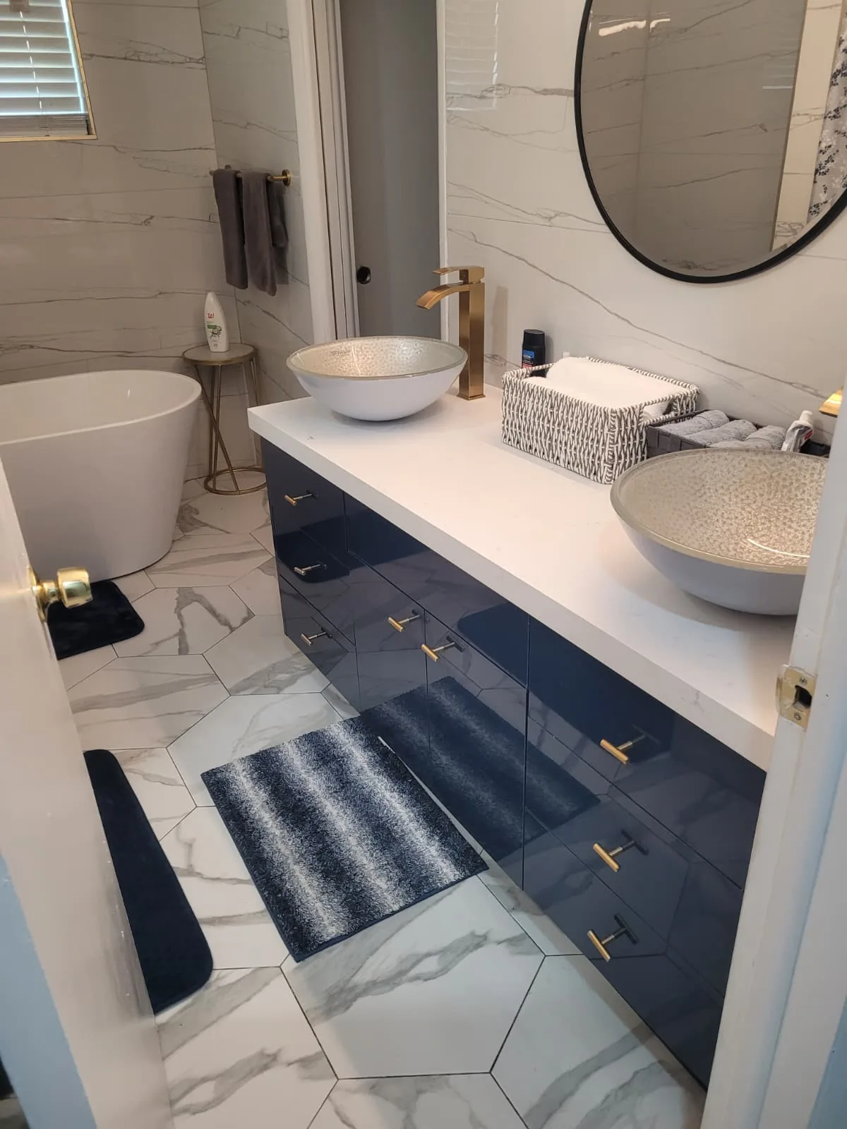 Navy double vanity with vessel sinks